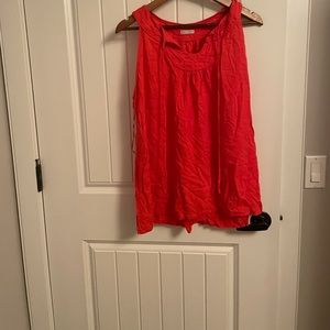 Sleeveless orange top